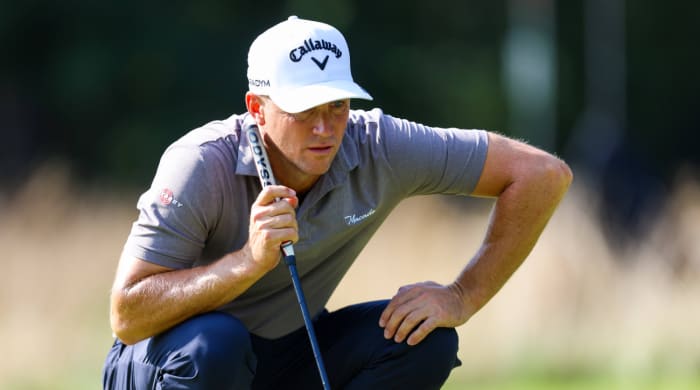 Alex Noren reads a green during a PGA Tour event.